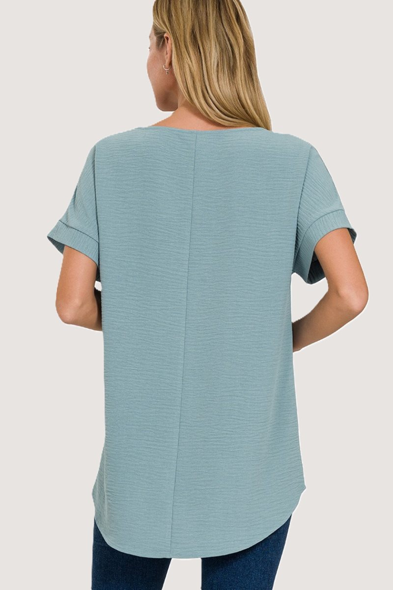 eco-friendly blue grey woven airflow V-neck top with hi-low hem