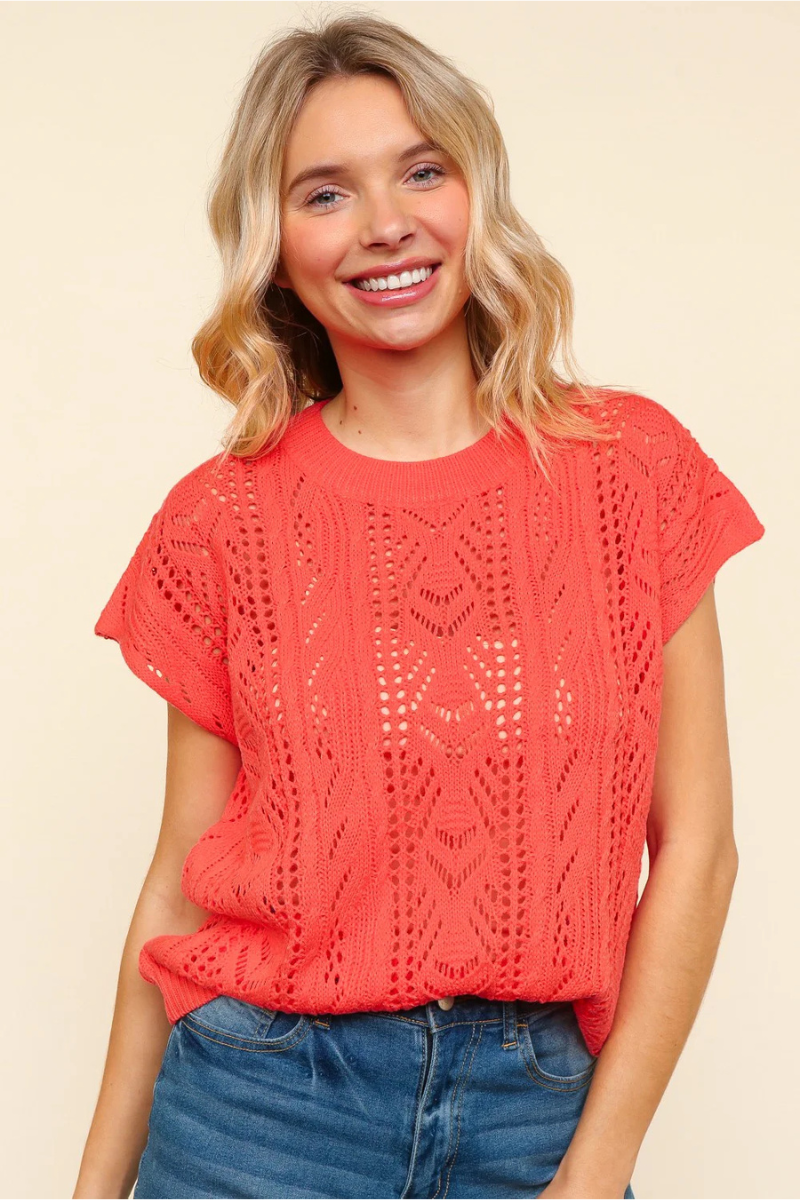 eco-friendly crocheted capped sleeve top in coral