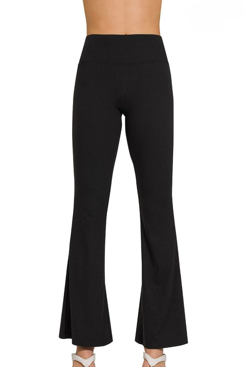 Black flared pants on a white background