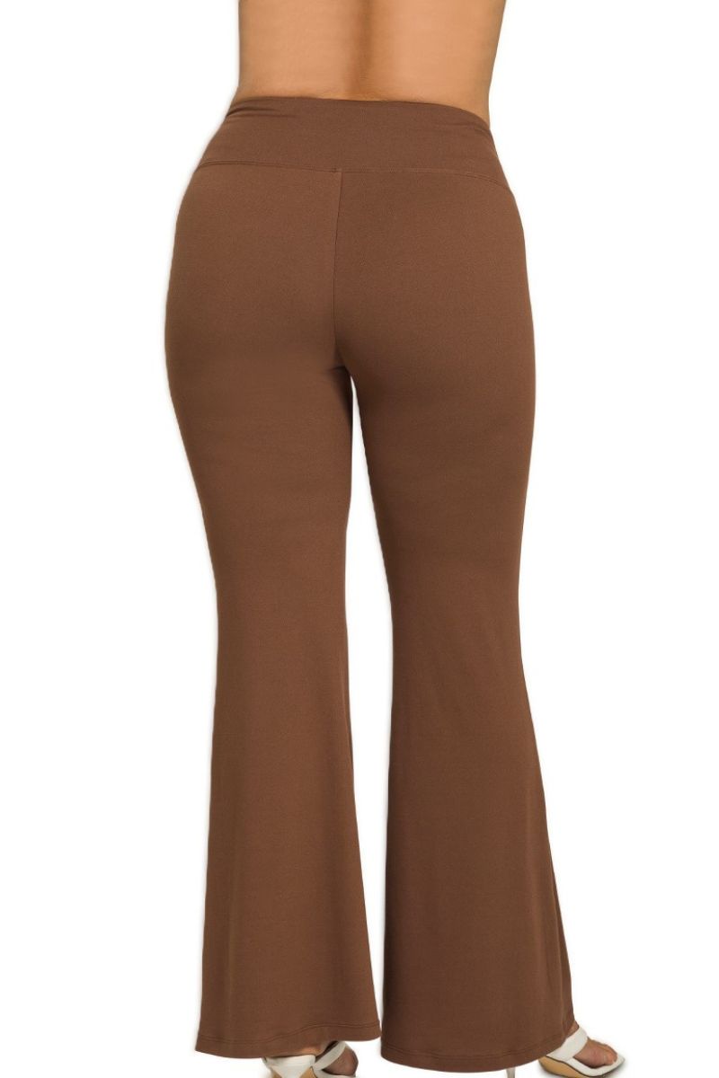 Brown flared pants on a white background