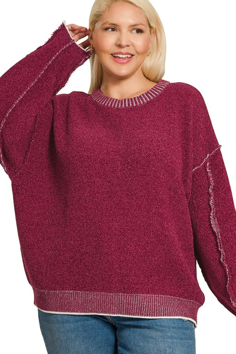 Woman wearing a maroon sweater on a white background