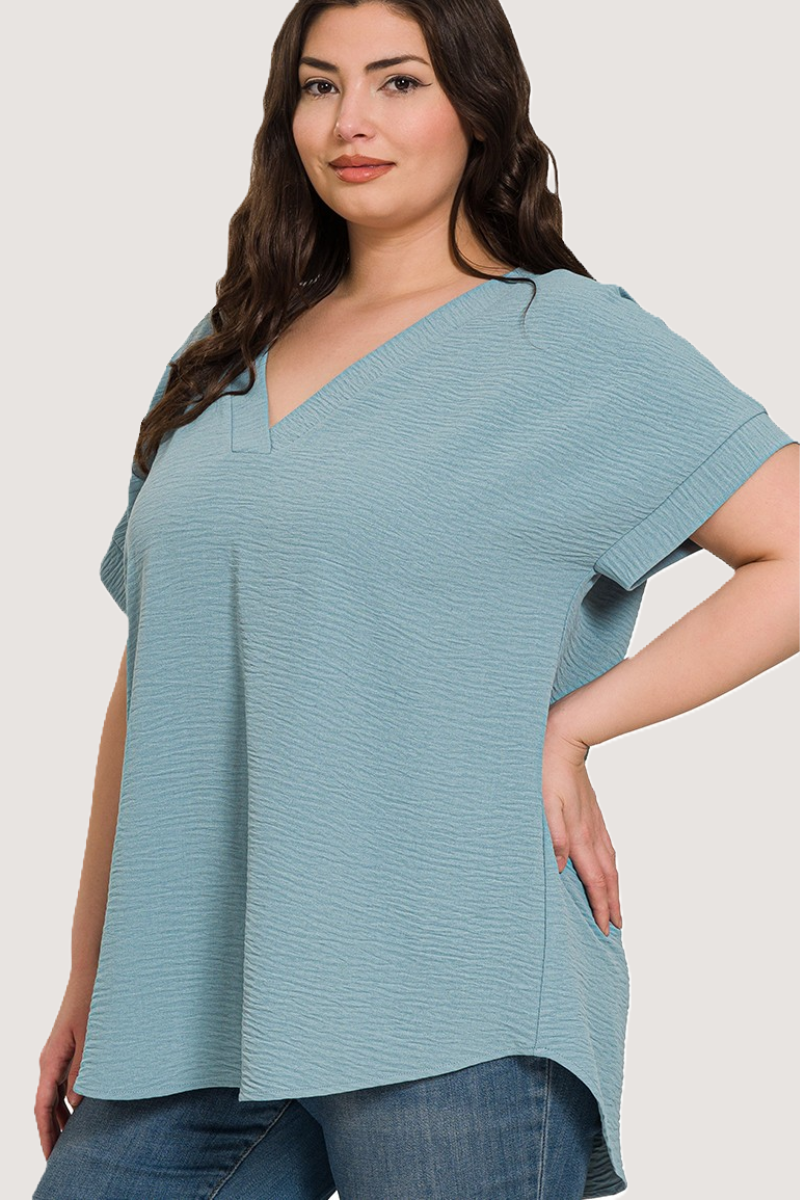 eco-friendly blue grey woven airflow V-neck top with hi-low hem