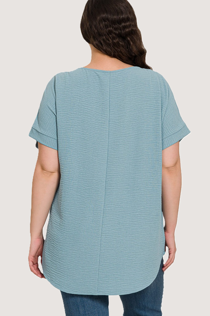 eco-friendly blue grey woven airflow V-neck top with hi-low hem
