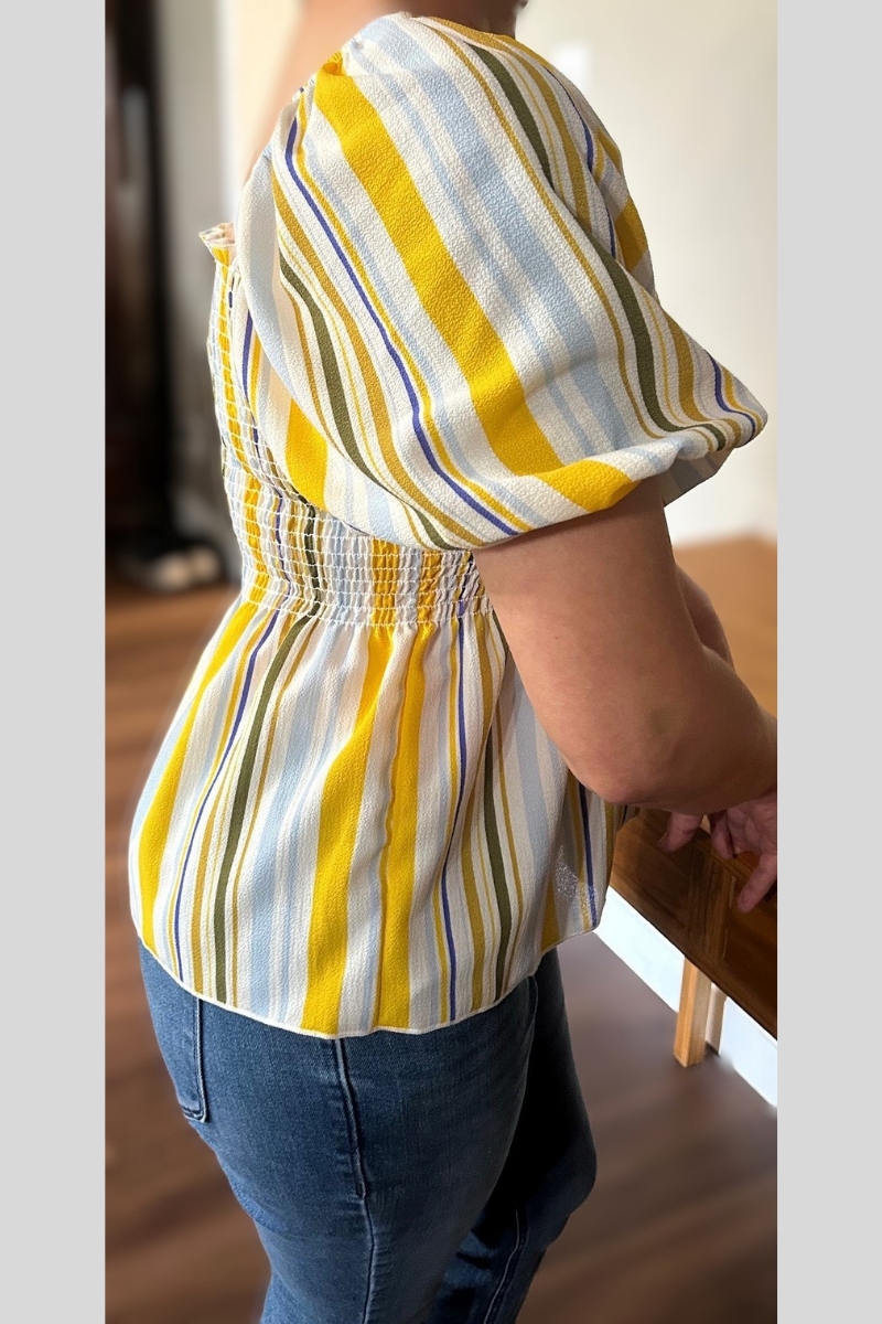 fun and flirty striped ruched blouse with babydoll look