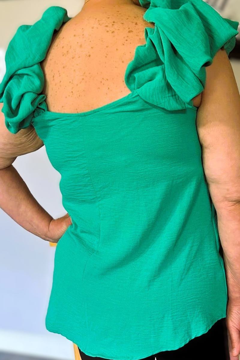 mint green blouse with balloon ruffle sleeves