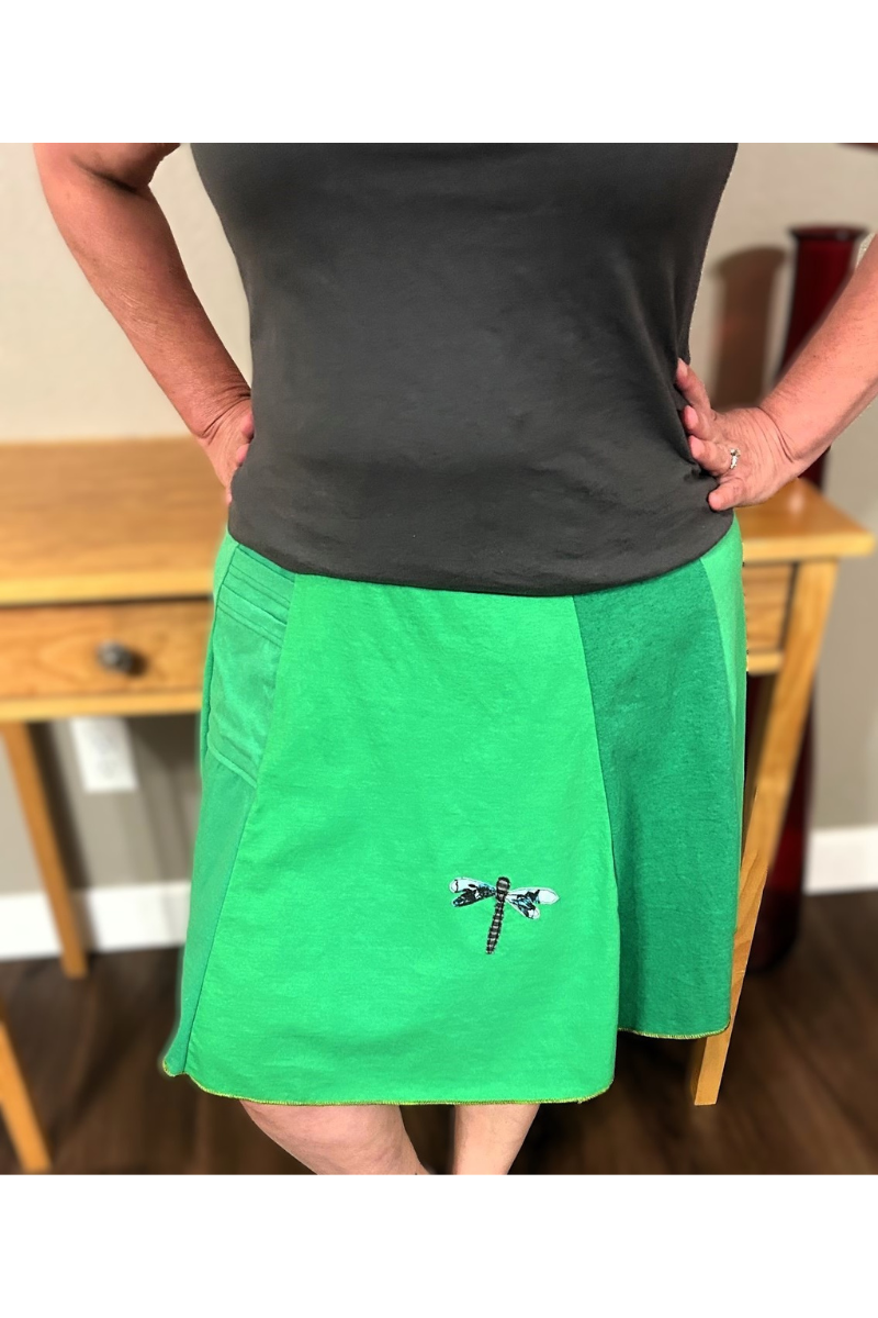 Upcycled cotton handmade dragonfly applique skirt in vibrant green colors with pocket.