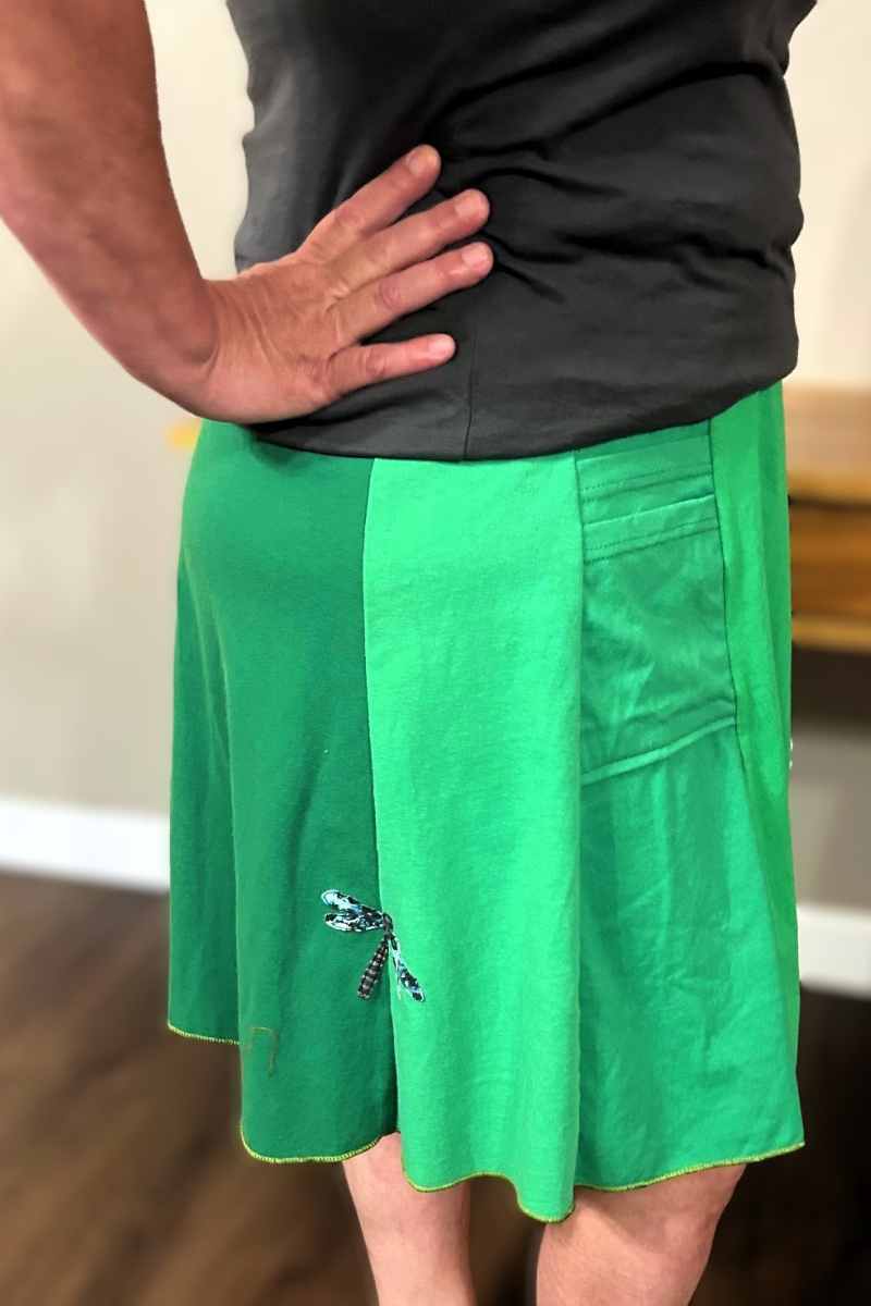 Upcycled cotton handmade dragonfly applique skirt in vibrant green colors with pocket.