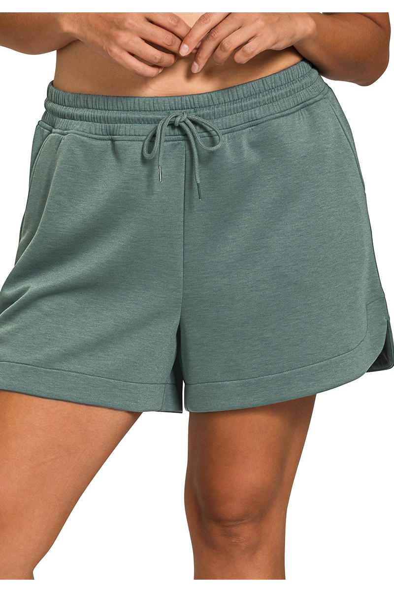 Green shorts with a drawstring on a white background