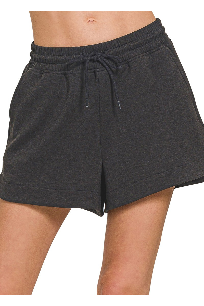 Dark gray shorts with drawstring on a white background