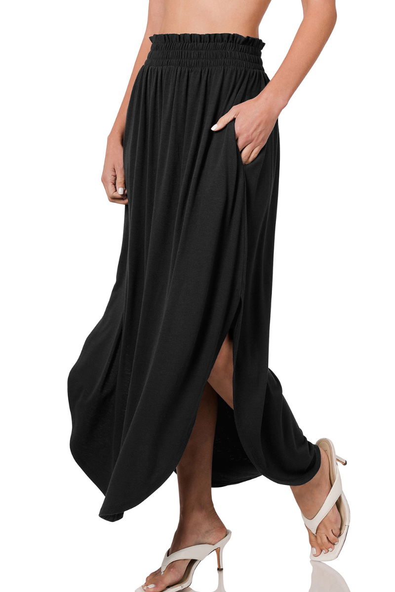 eco-friendly black smocked waist maxi skirt with side slits and pockets