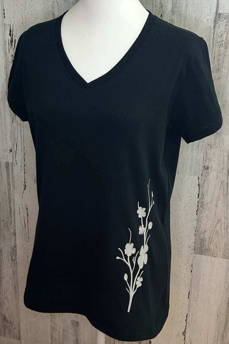 Gildan V-neck black tee with a unique cherry blossom silhouette design printed with eco-friendly ink.