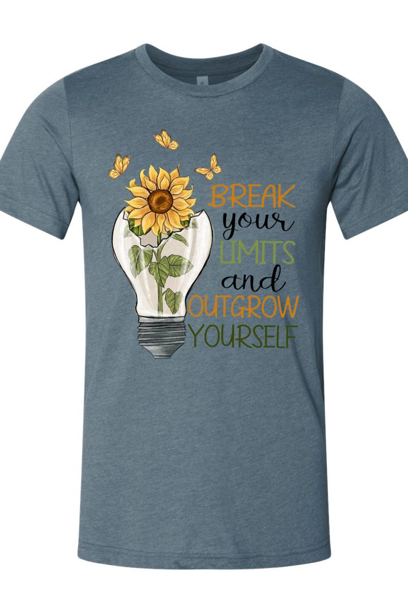Blue t-shirt with sunflower design and motivational text on a white background