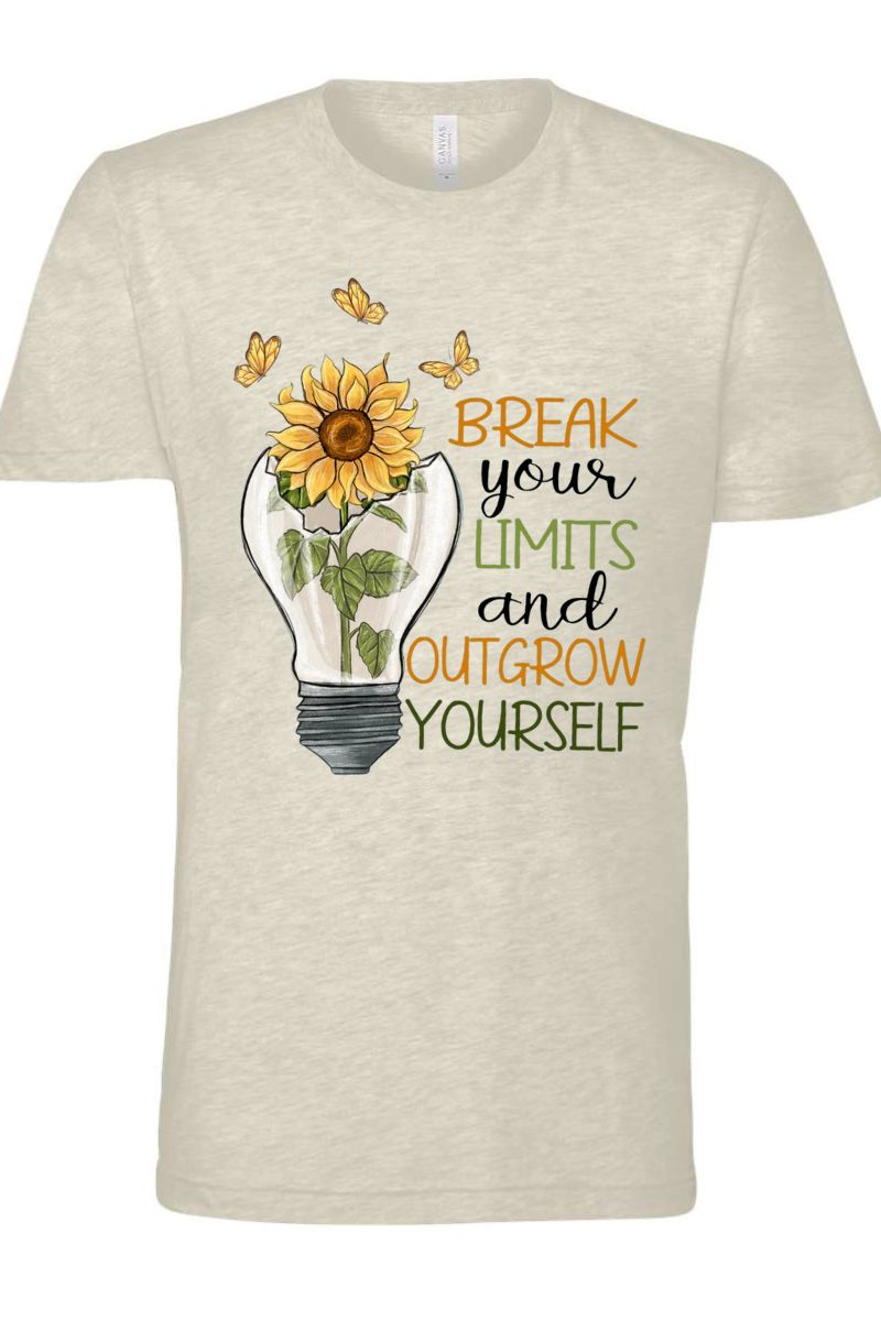 Beige t-shirt with sunflower and light bulb graphic and motivational text on a white background