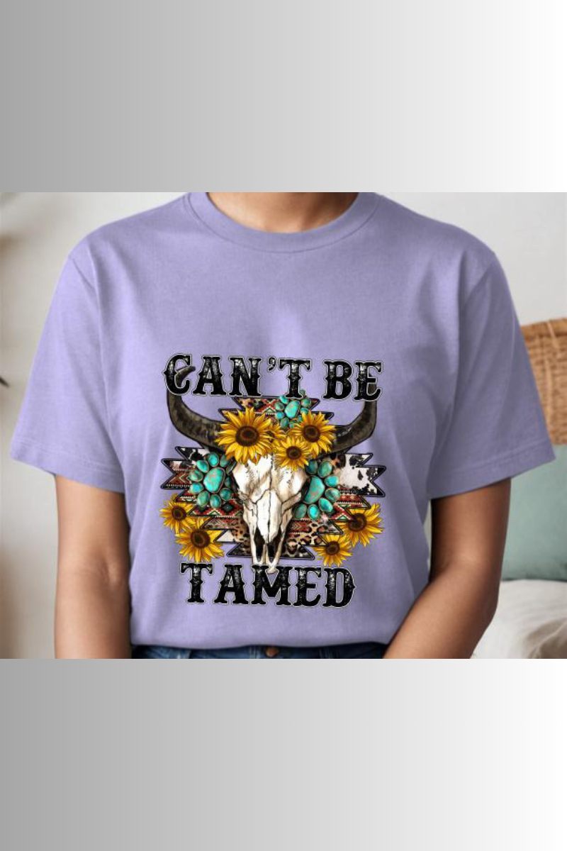 Eco-friendly Bella + Canvas unisex tee with Western design and the caption "Can't Be Tamed"