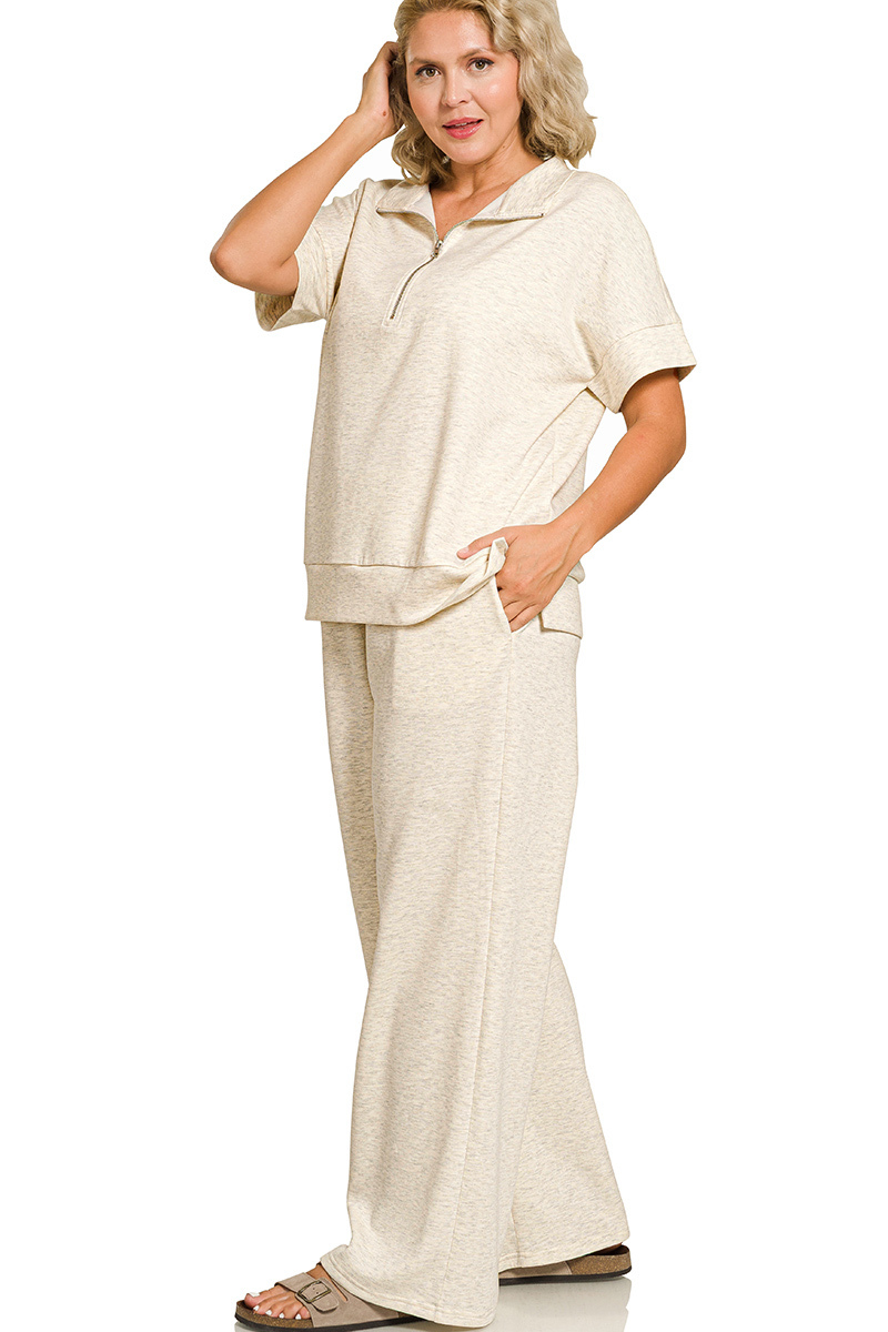 Woman wearing a beige outfit on a white background