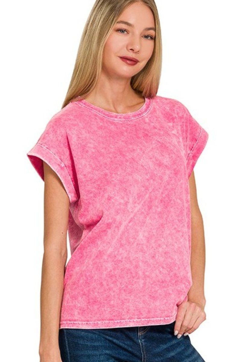 Woman wearing a pink t-shirt against a white background