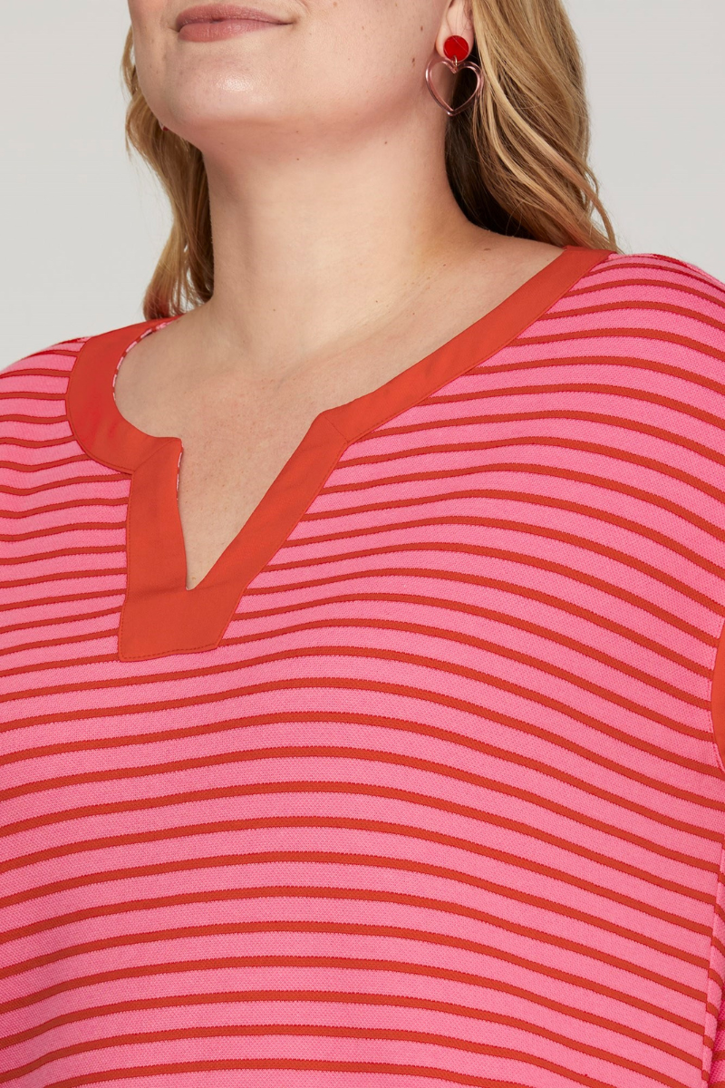 sustainable casual dress pink and red striped with capped sleeves, just above knee length, and pockets.