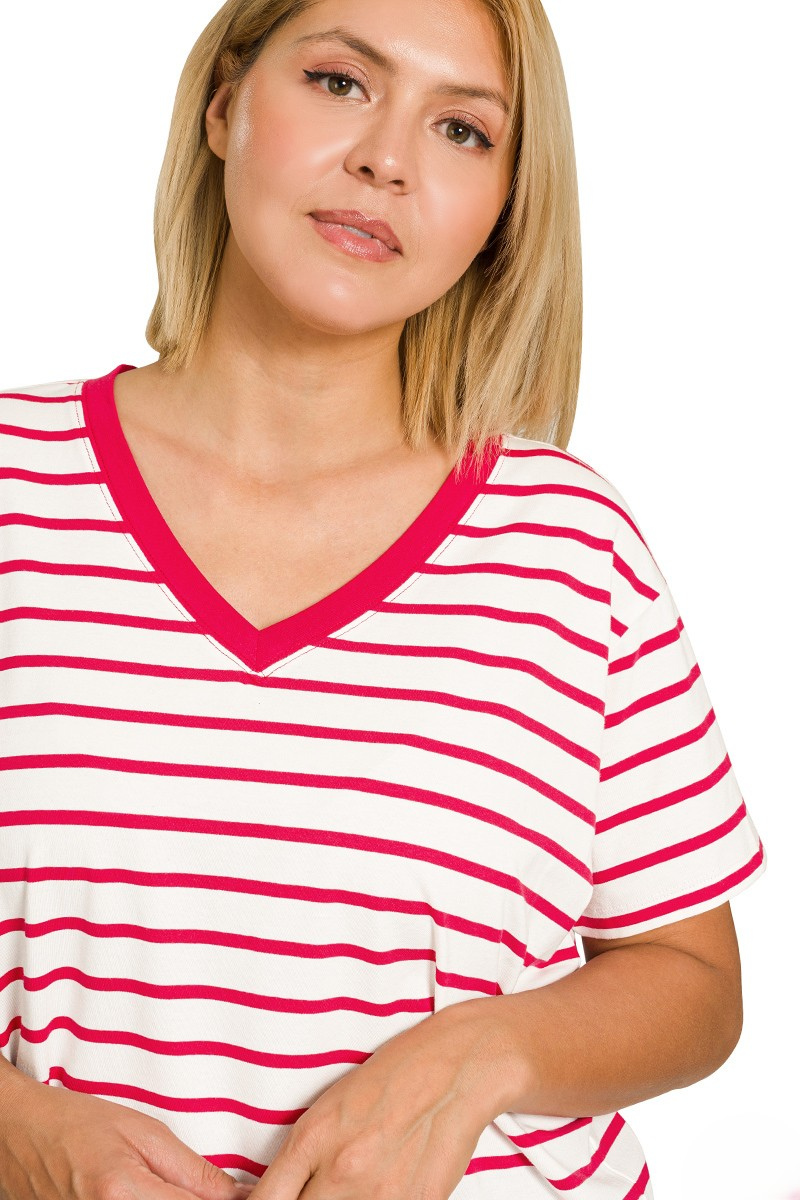 Woman wearing a red and white striped shirt on a white background