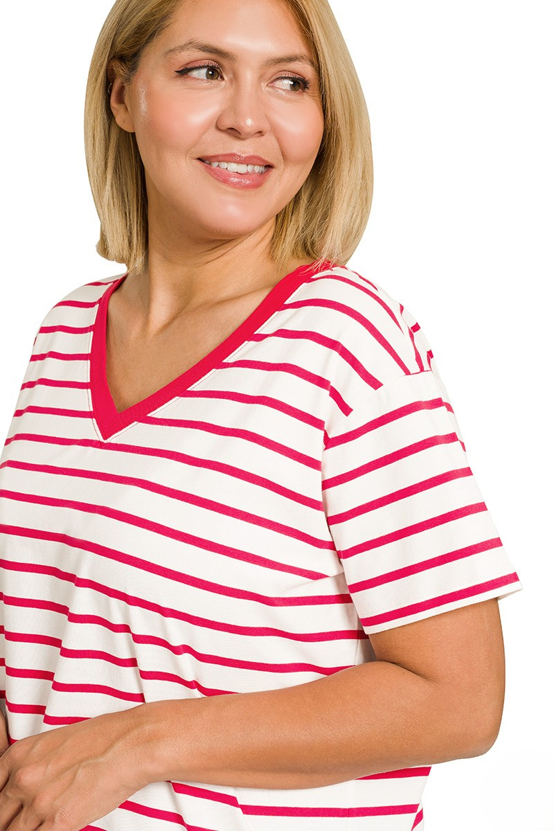 Woman wearing a red and white striped shirt on a white background