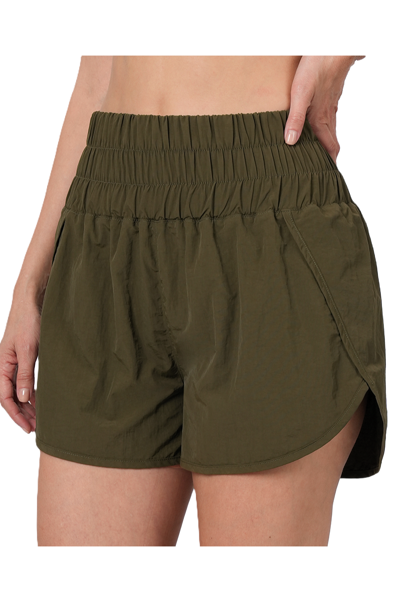 Sustainable eco-friendly windbreaker running shorts in dark olive