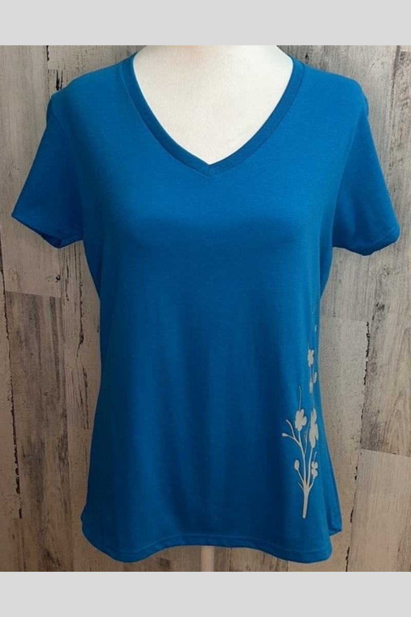 Gildan ladies v-neck tee in sapphire with cherry blossom silhouette printed with eco-friendly ink.